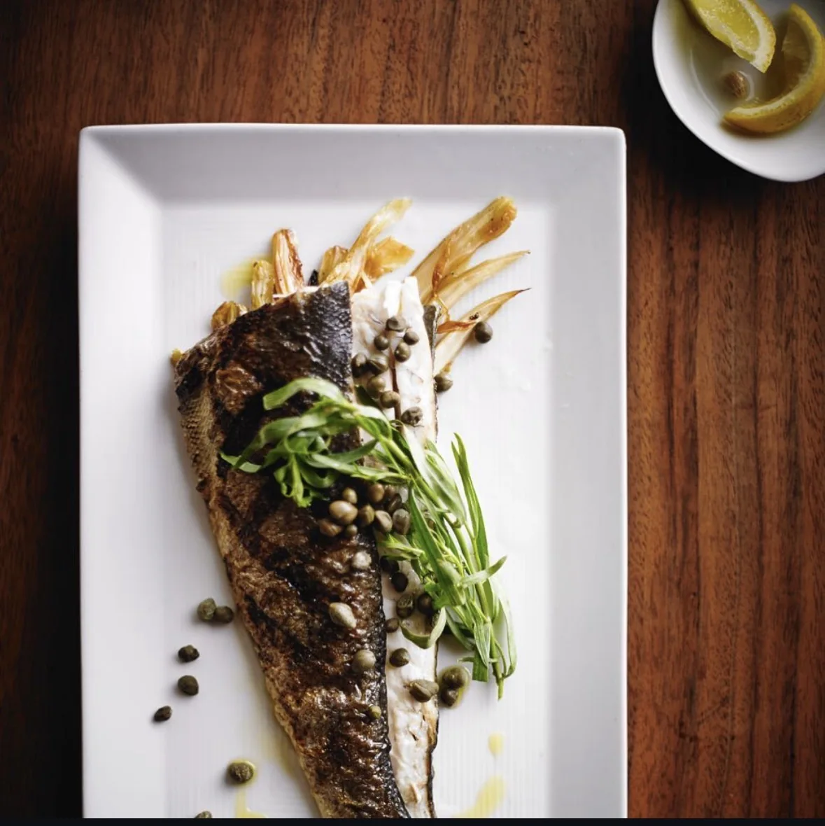 Roasted whole fish with capers and herbs